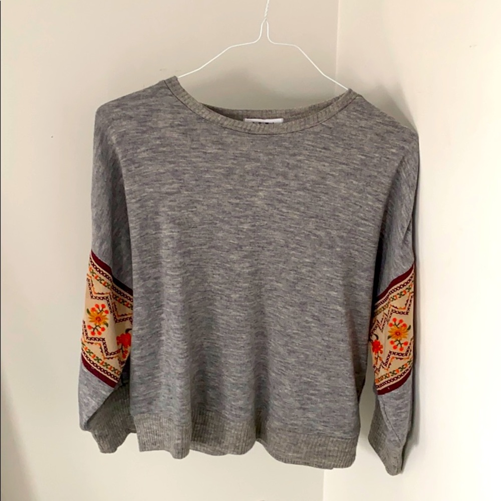 Grey and embroidered sweater